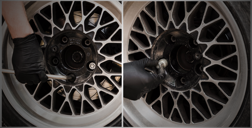 A person uses a wrench to change a tire, focusing on removing the wheel to inspect or replace brake pads
