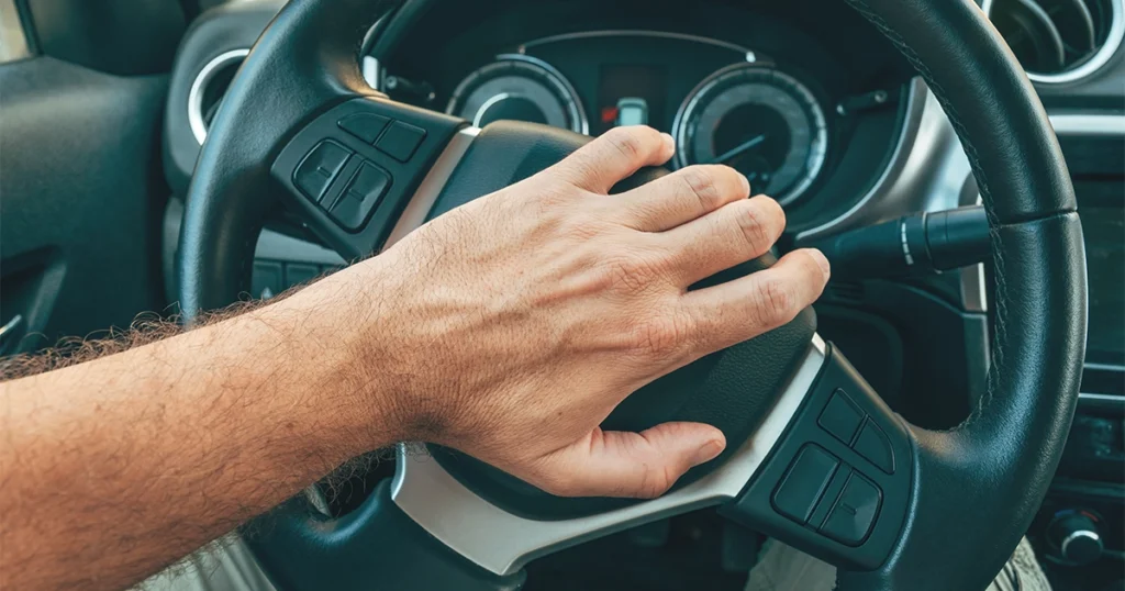 Trouble turning the steering wheel in a car