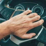 Trouble turning the steering wheel in a car