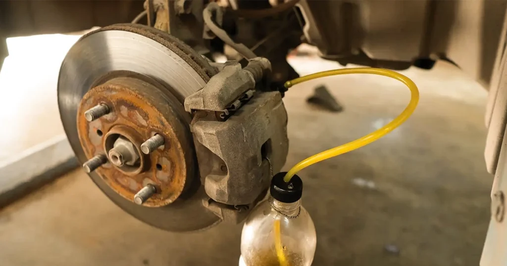 Bleeding car brakes to fix a spongy brake pedal.