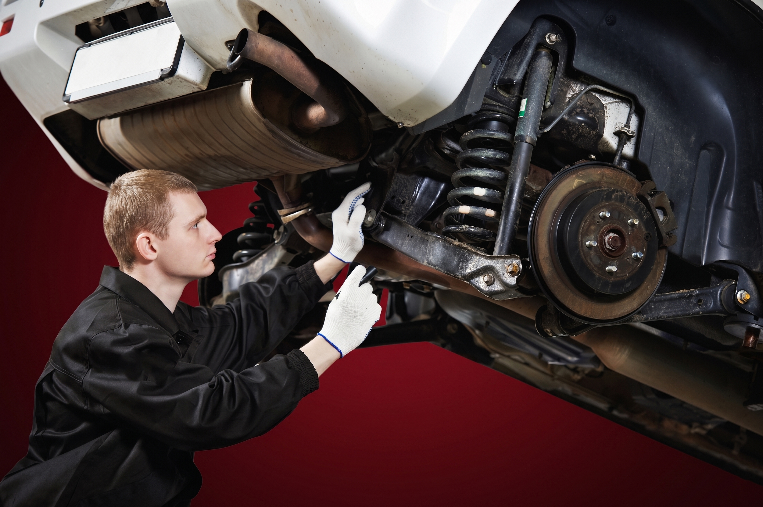Why Your Car Suspension Is Squeaking Over Bumps